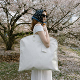 travel friendly garment bag with interior organization pocket